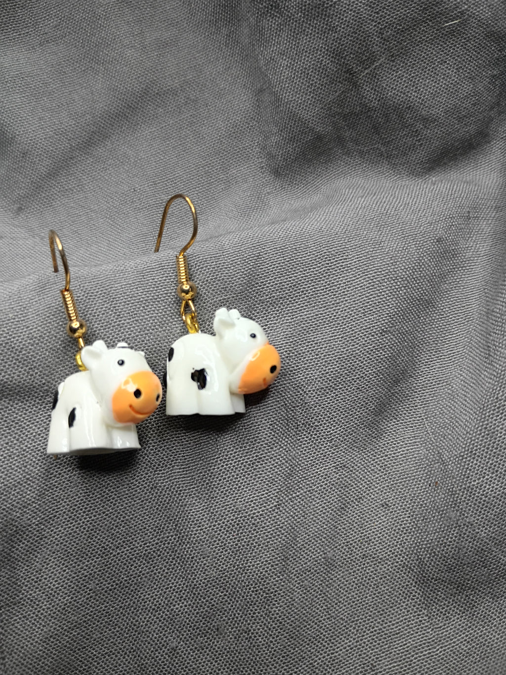 Tiny cow earrings