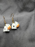 Tiny cow earrings